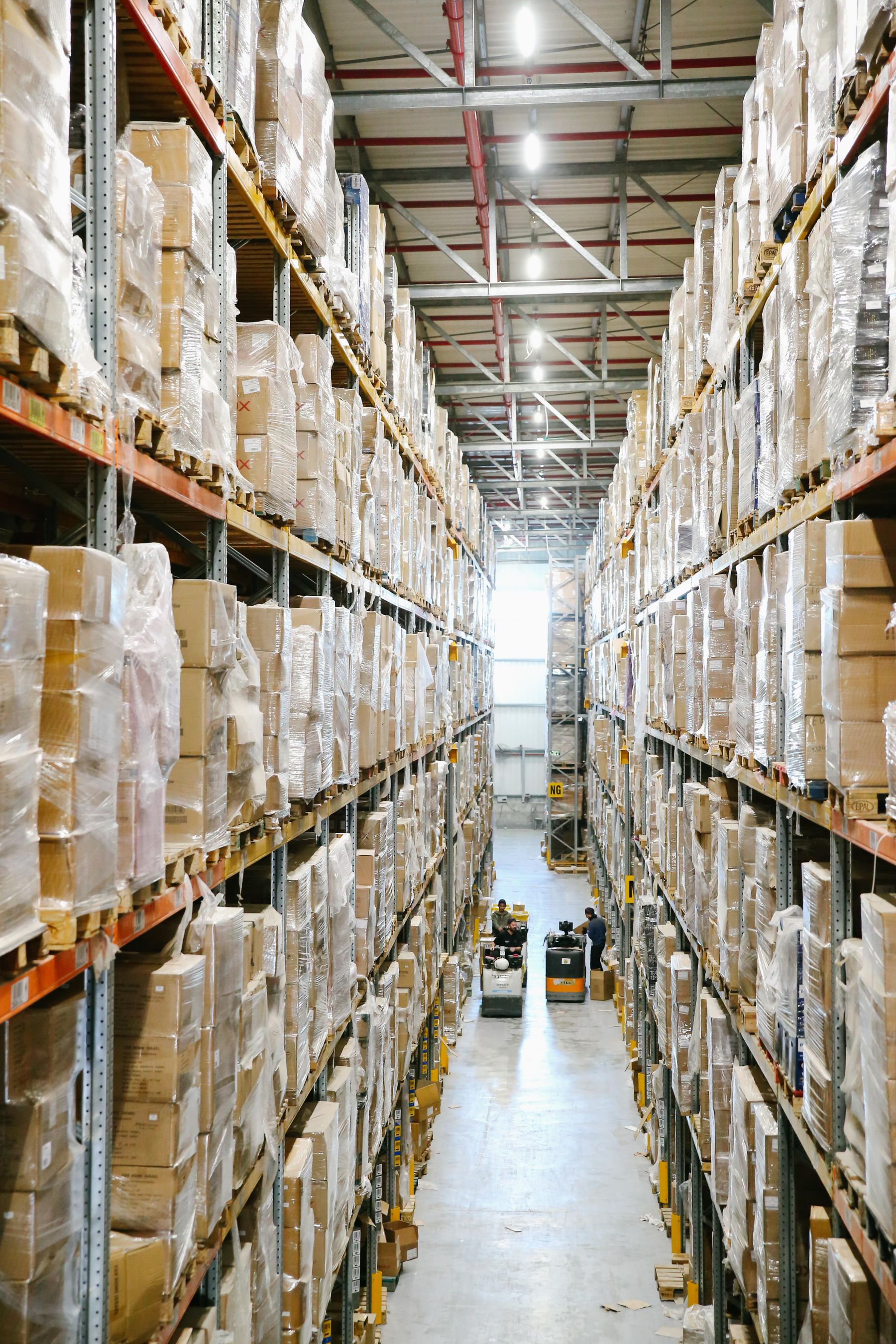 Warehouse aisles lined with boxed inventory